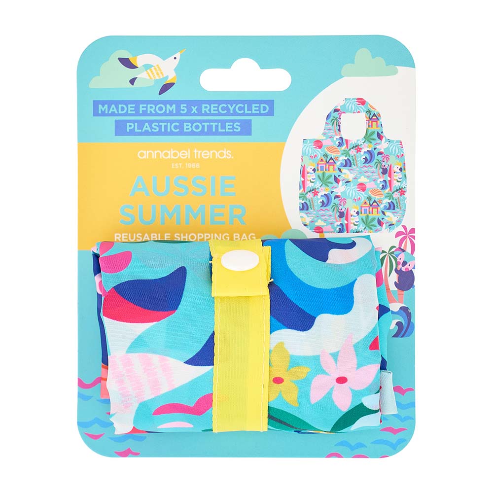 Reusable shopping bag with 'Aussie Summer' design on a blue packaging background