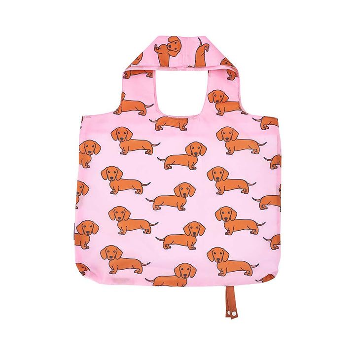 Pink reusable bag with dachshund pattern on a white background