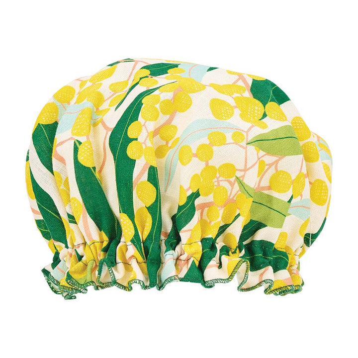Floral patterned shower cap on a white background