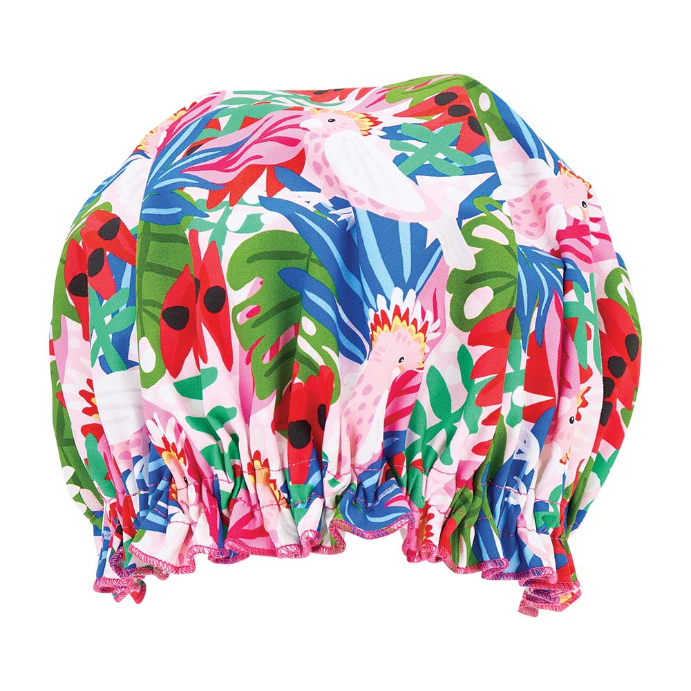 Colorful shower cap with parrot and leaf pattern on a white background
