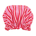 Red and white striped shower cap on a white background