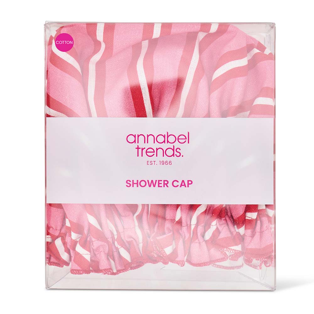 Packaged shower cap with pink and white design and 'annabel trends' branding.