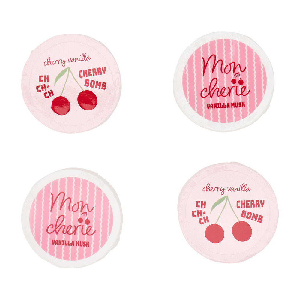Four round containers with cherry-themed text on a white background