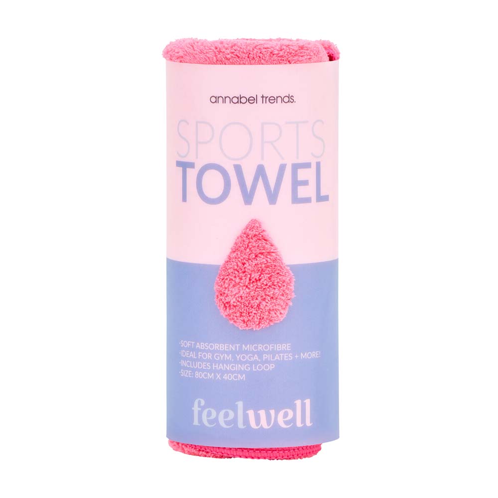 Sports towel packaging with pink towel and 'feelwell' branding on a white background