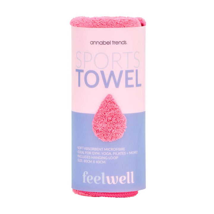 Sports towel packaging with pink towel and 'feelwell' branding on a white background