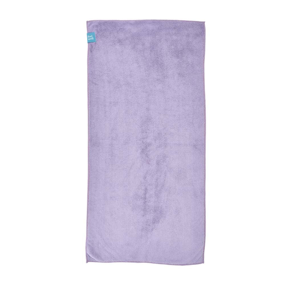 Purple towel with a brand tag on a white background