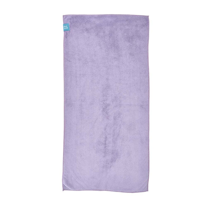 Purple towel with a brand tag on a white background