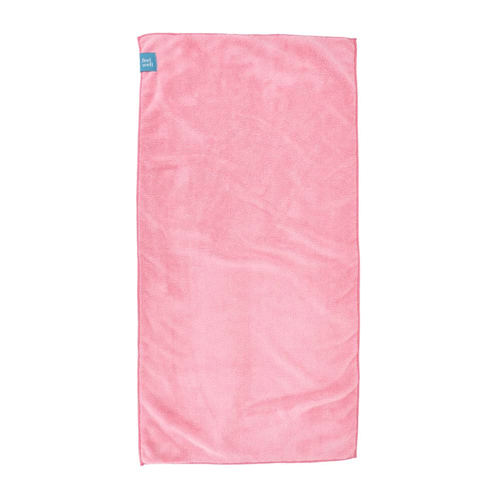 Pink towel with a blue label on a white background