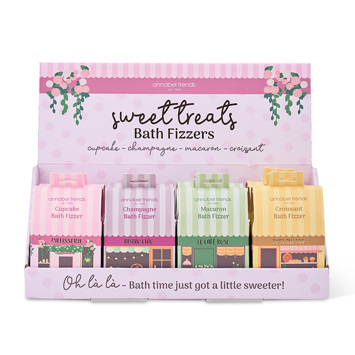Display of Annabelle Trends bath fizzers with colorful packaging on a white background