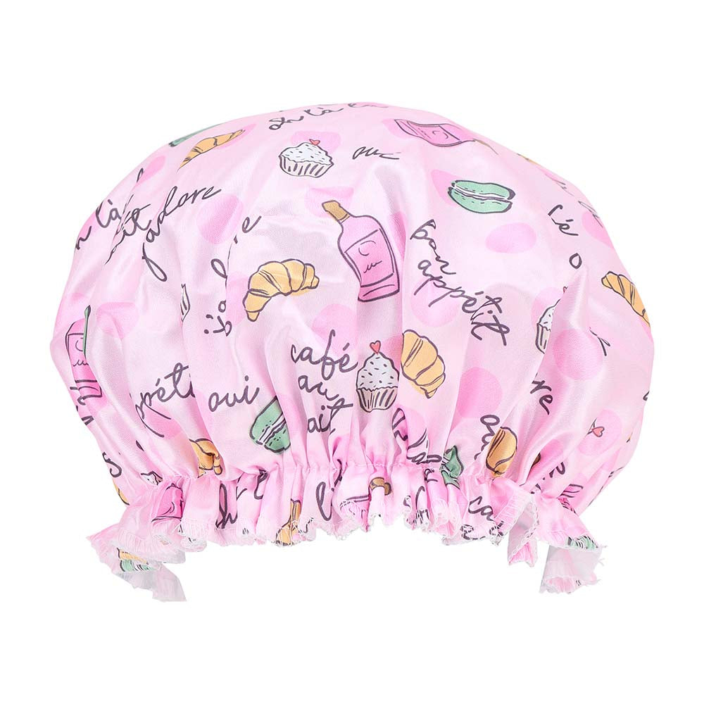 Pink shower cap with food-themed illustrations on a white background