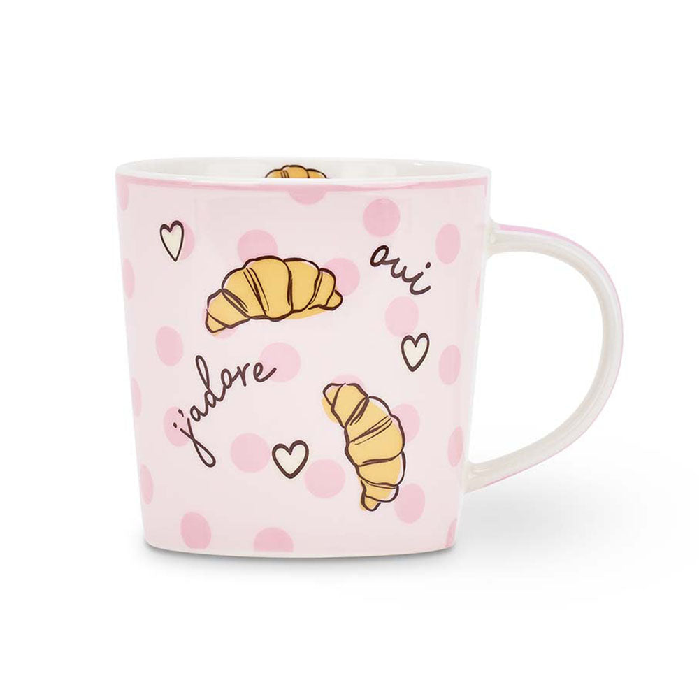 Pink mug with croissant illustrations and text on a white background