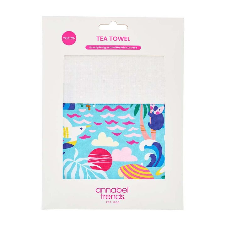 Packaged tea towel with colorful design and 'annabel trends' branding on a white background