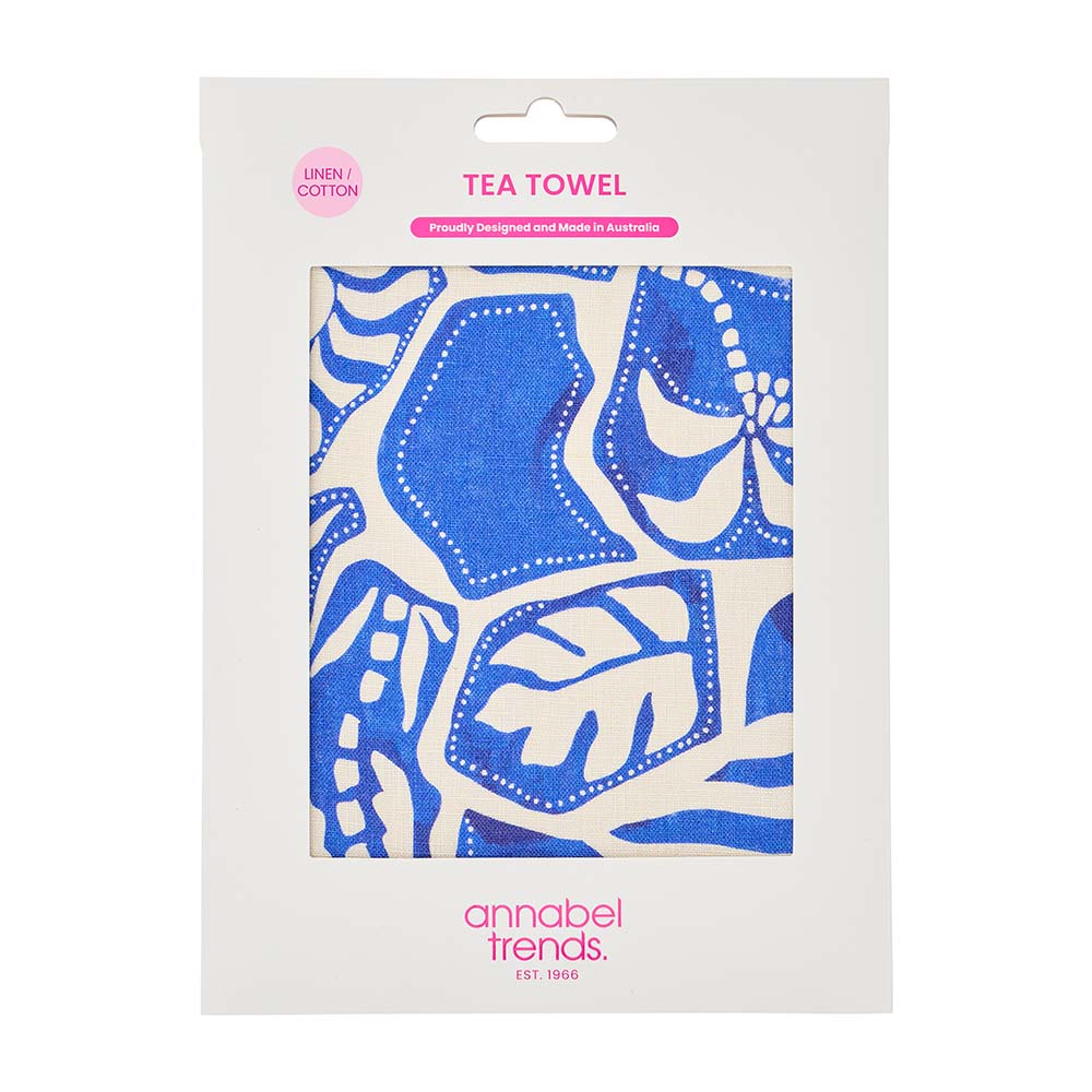 Tea towel packaging with blue and white pattern and 'annabel Trends' branding