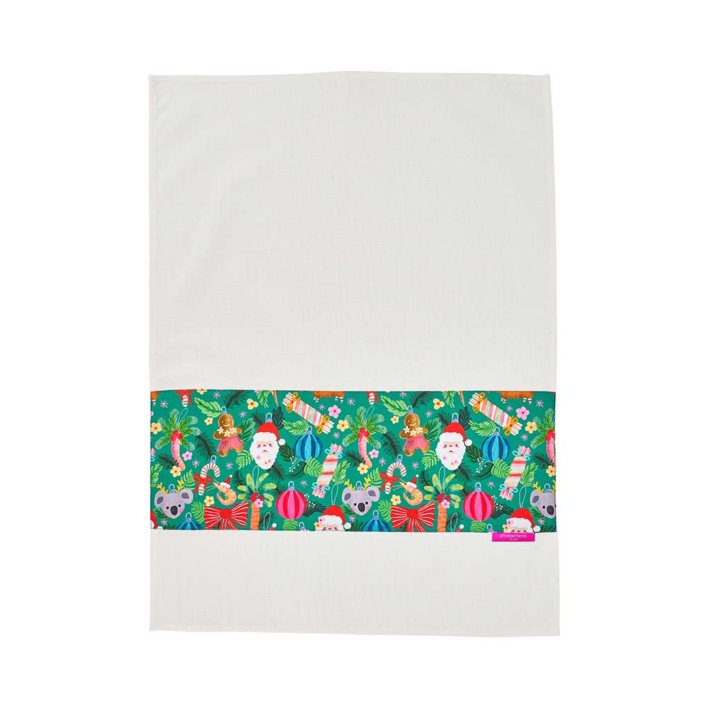 green christmas print on tea towel