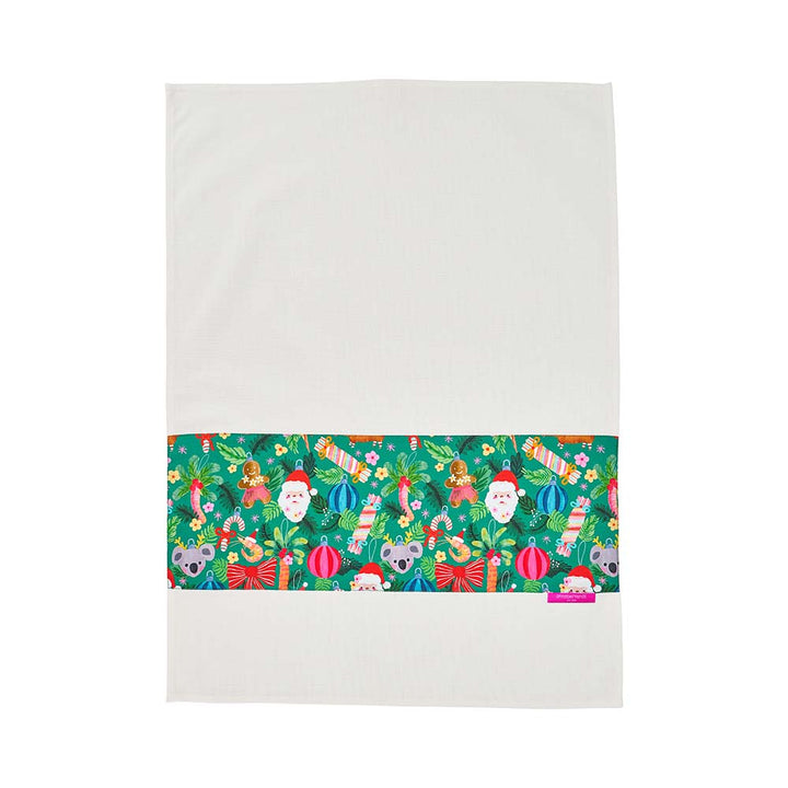 green christmas print on tea towel