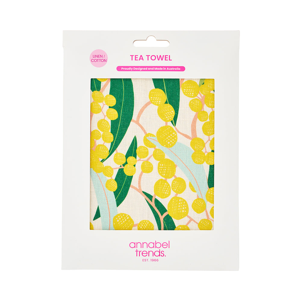 Tea towel packaging with yellow floral design and 'annabel Trends' branding.