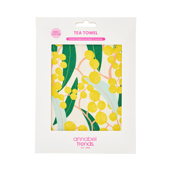 Tea towel packaging with yellow floral design and 'annabel Trends' branding.