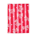 Red and pink striped tea towel with white bow patterns