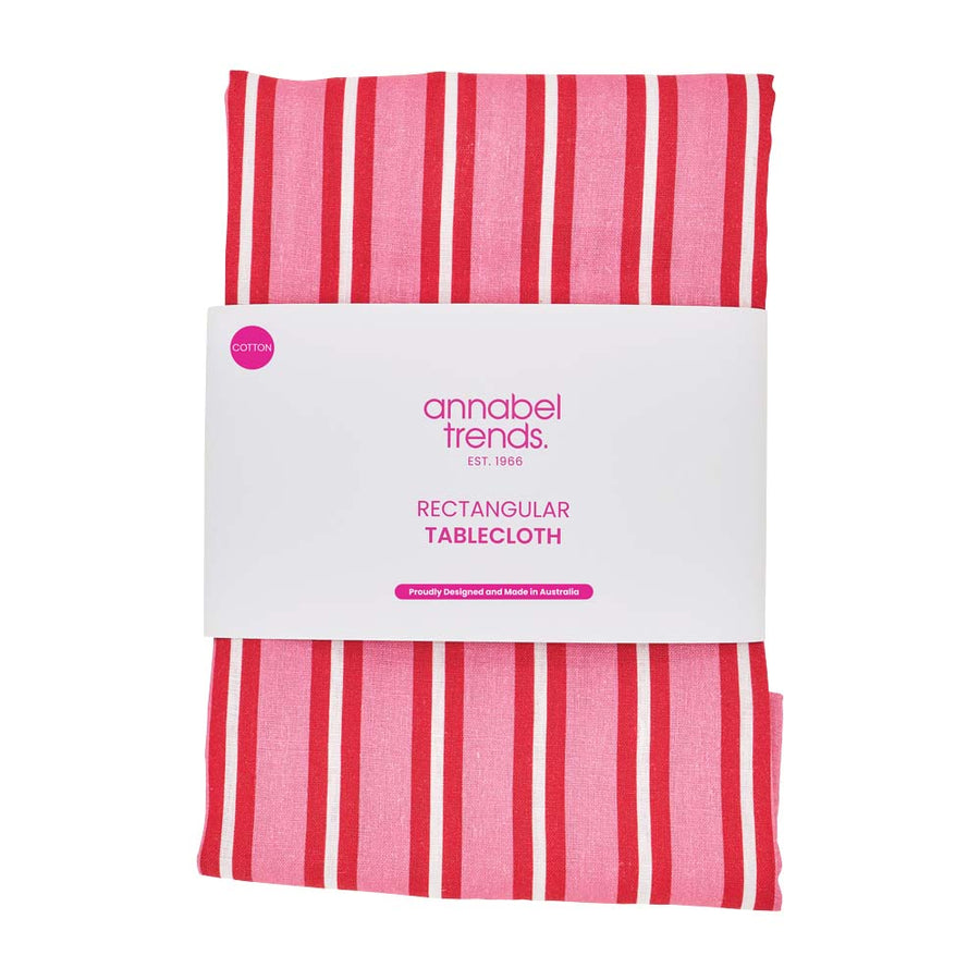 Red and pink striped rectangular tablecloth with 'annabel trends' packaging on a white background
