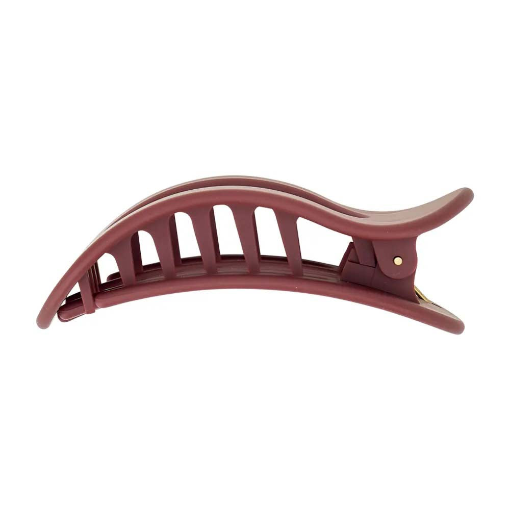 Brown hair clip on a white background