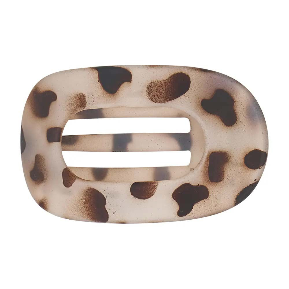 Leopard print hair clip on a white background