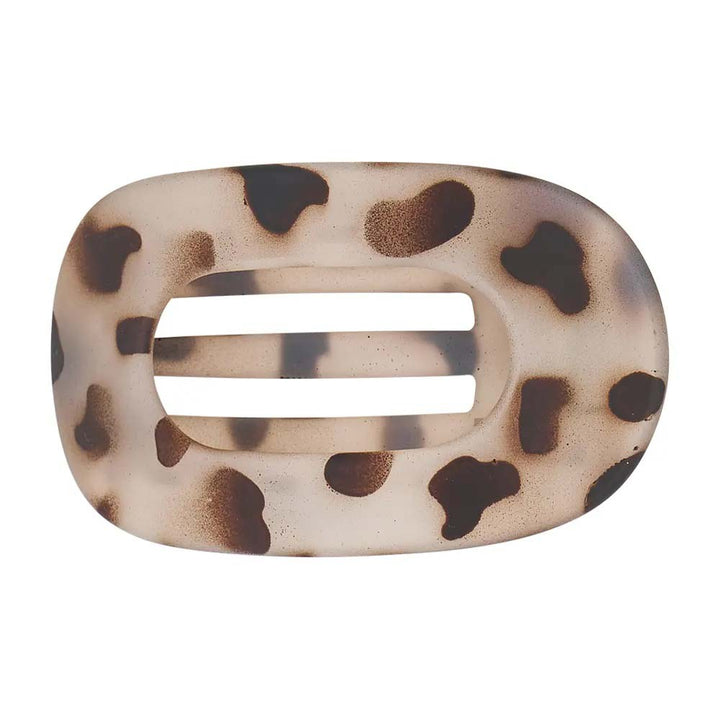 Leopard print hair clip on a white background
