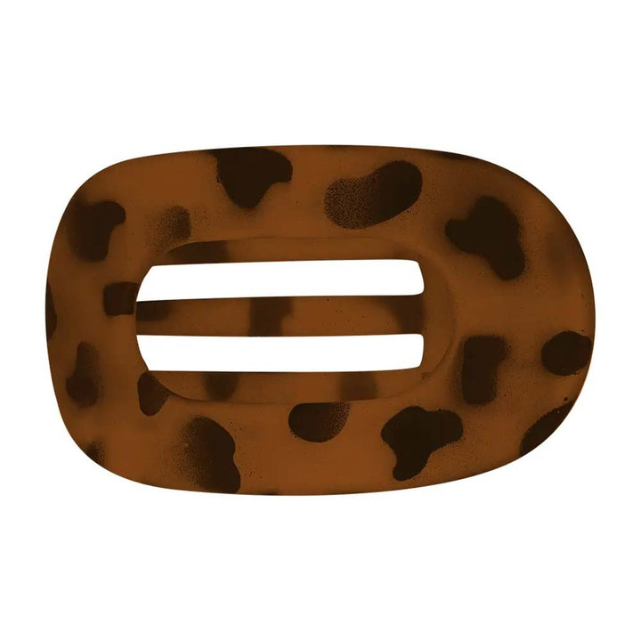 Leopard print hair clip on a white background