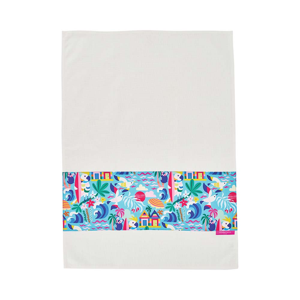 Colorful beach-themed border on a white cotton Tea towel