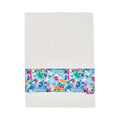 Colorful beach-themed border on a white cotton Tea towel