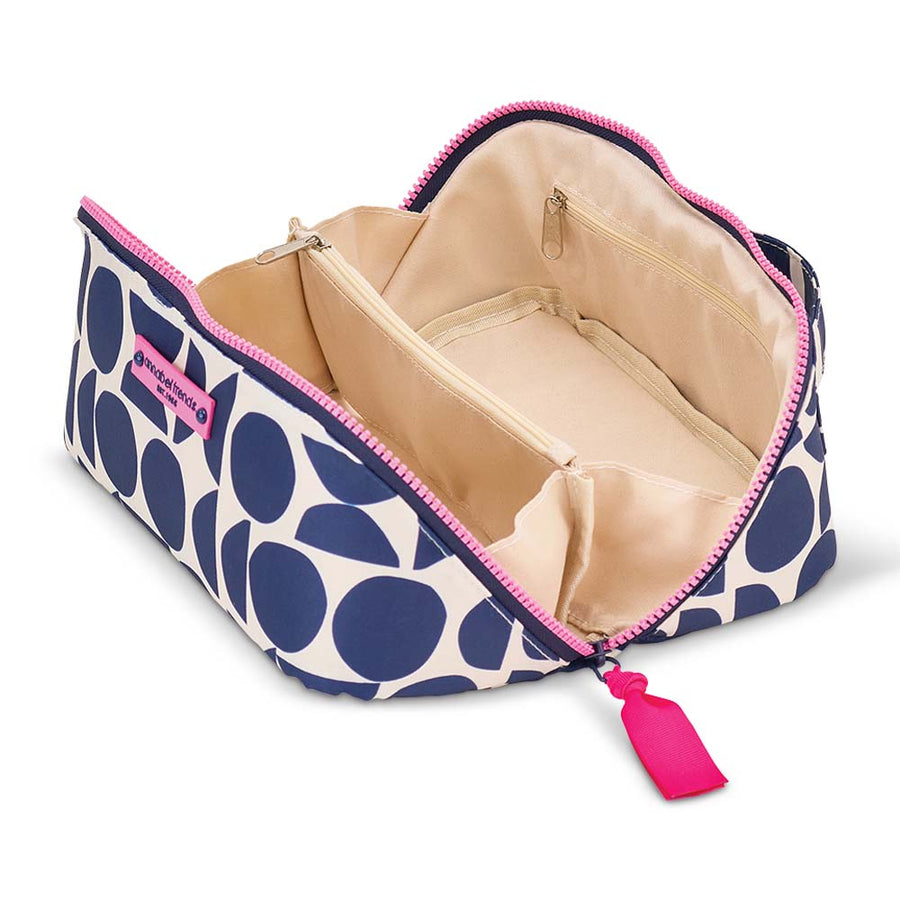 Cosmetic bag with blue and white pattern and pink zipper on a white background