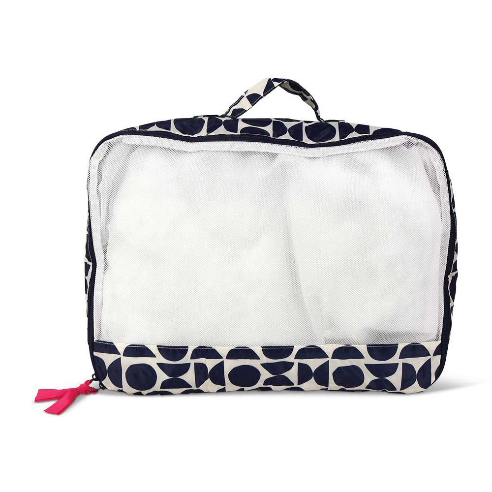 Clear packing cube with navy geometric pattern on a white background