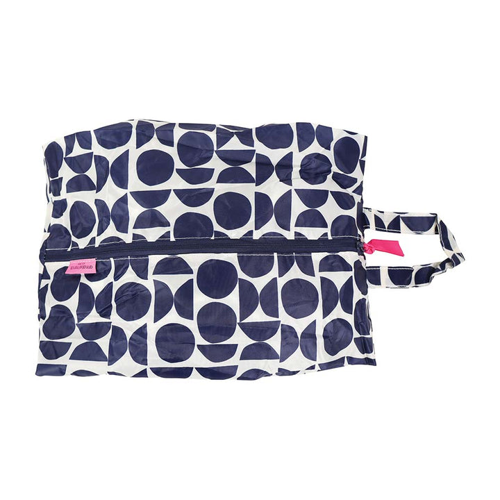 Navy blue and white patterned shoe bag with a pink tag on a white background