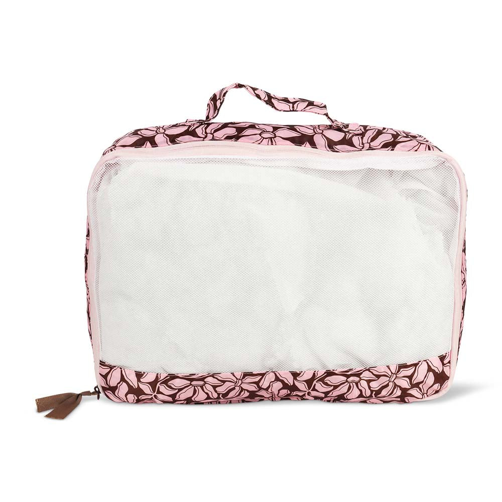 Pink floral-patterned packing cube on a white background