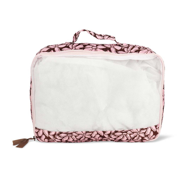 Pink floral-patterned packing cube on a white background