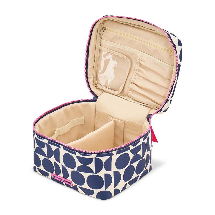 Open cosmetic bag with blue and white pattern on a white background