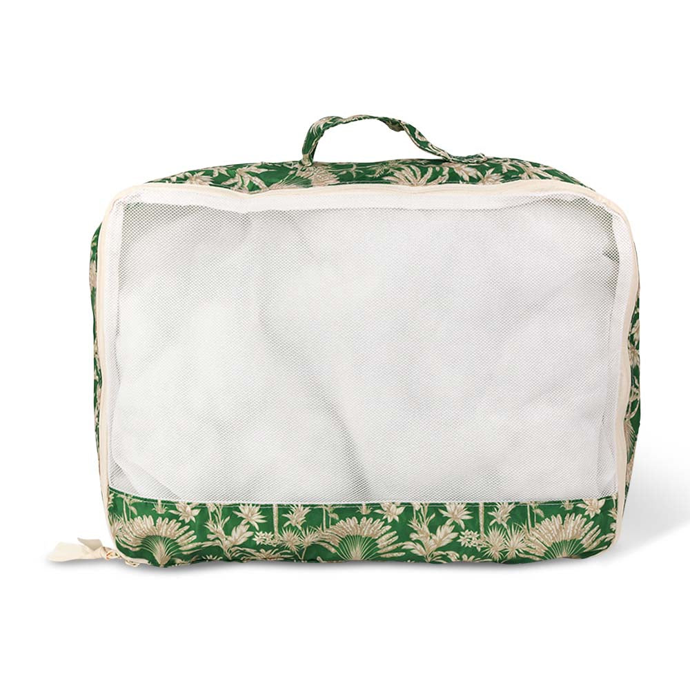 Green floral-patterned packing cube on a white background