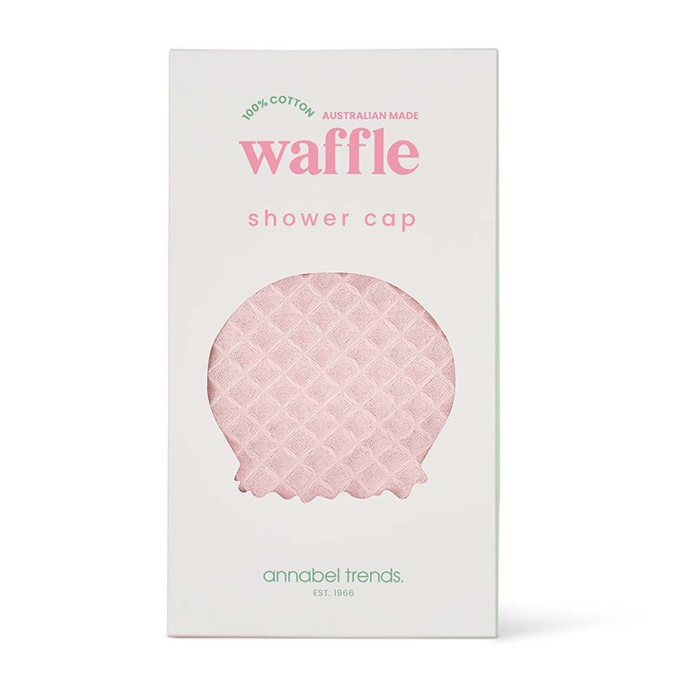 Pink waffle shower cap packaging with 'annabel trends' branding on a white background