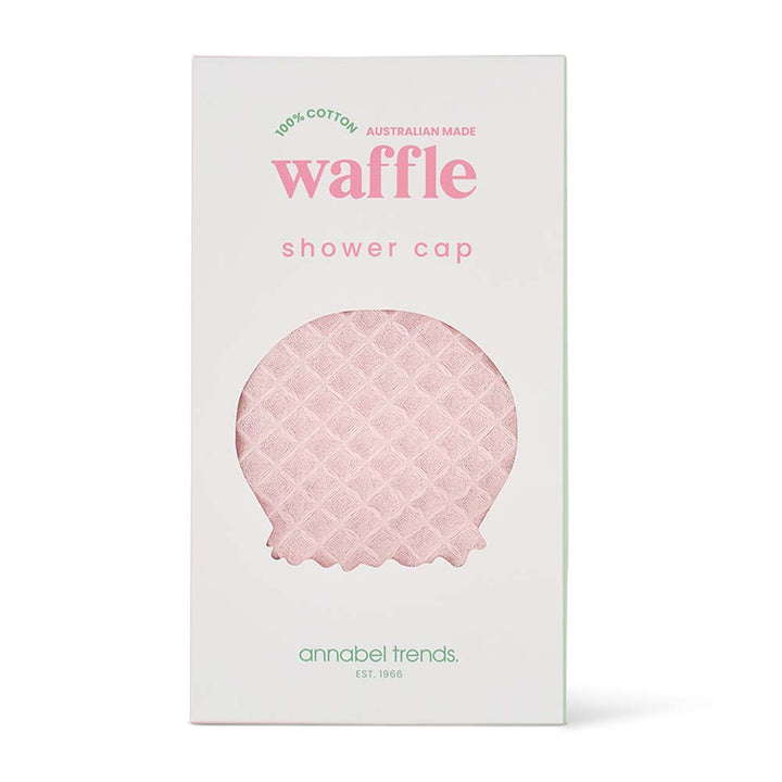 Pink waffle shower cap packaging with 'annabel trends' branding on a white background