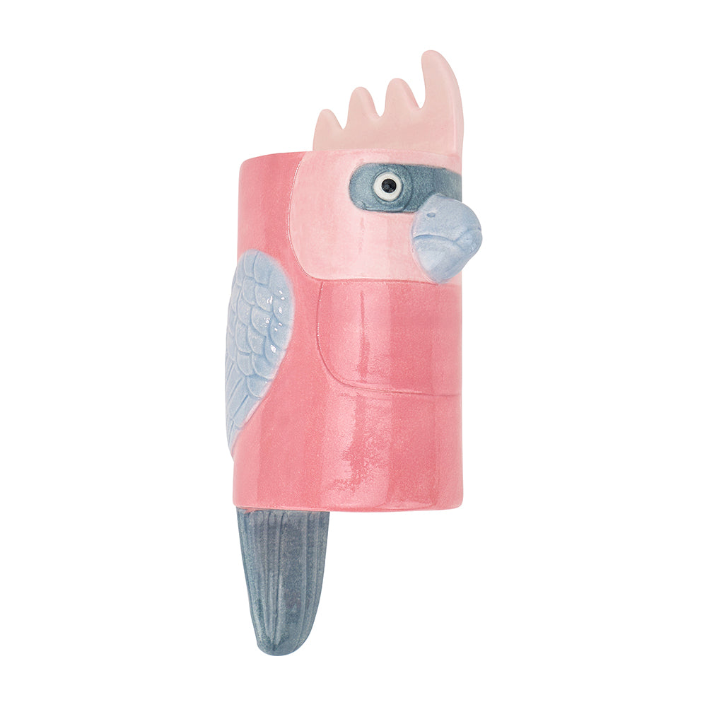 ceramic wall vase shaped like a pink galah with pink crest and beak on a white background