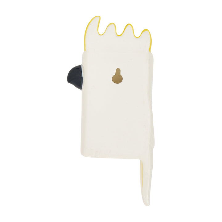 White ceramic wall vase shaped like a cockatoo with yellow crest and beak on a white background