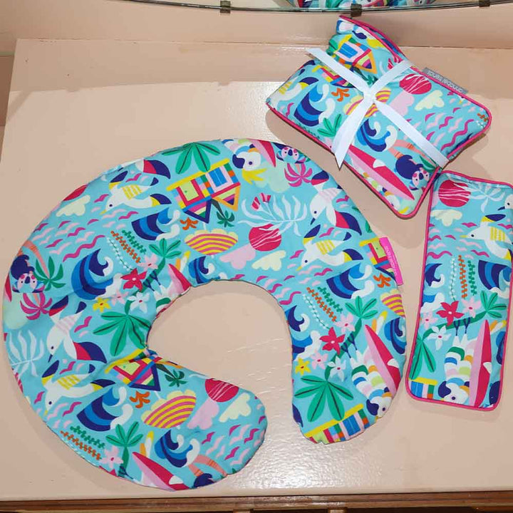 Colorful neck heat pillow with animal pattern on a wooden surface