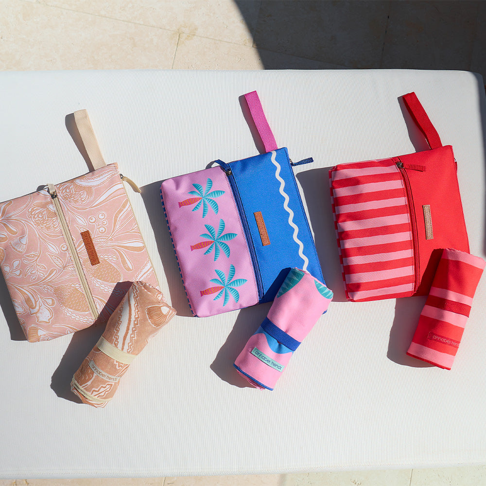 Annabel Trends beach wet pouches and sand free beach towel in trailing natives, red stripe and fiesta designs