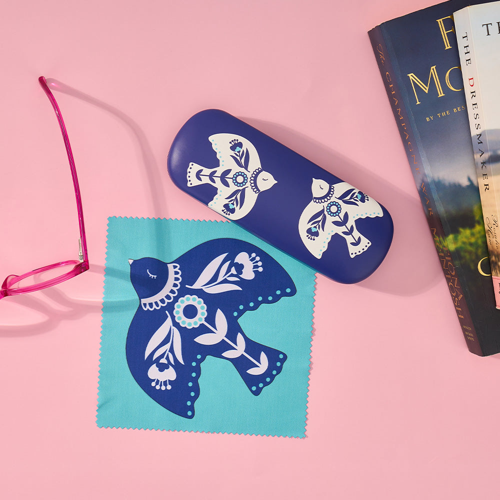 celestial dreams Blue Bird glasses case and cleaning cloth on a pink background