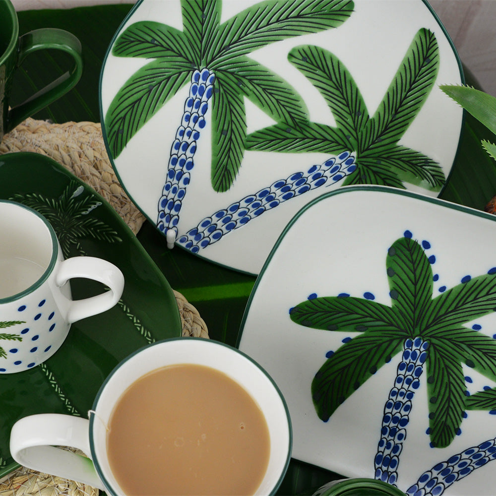 Coconut bay ceramic range featuring palms and dots in a green and white variation