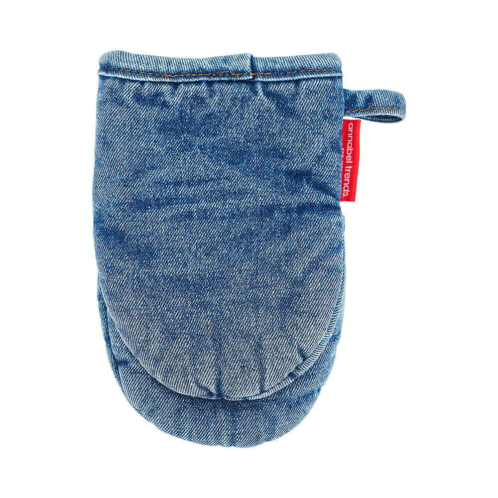 Blue denim oven mitt with a red label on a white background