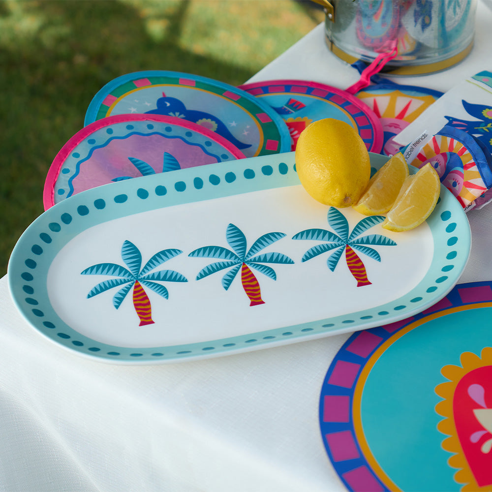 Annabel Trends Fiesta table setting with fiesta serving platter, placemats, twist fans