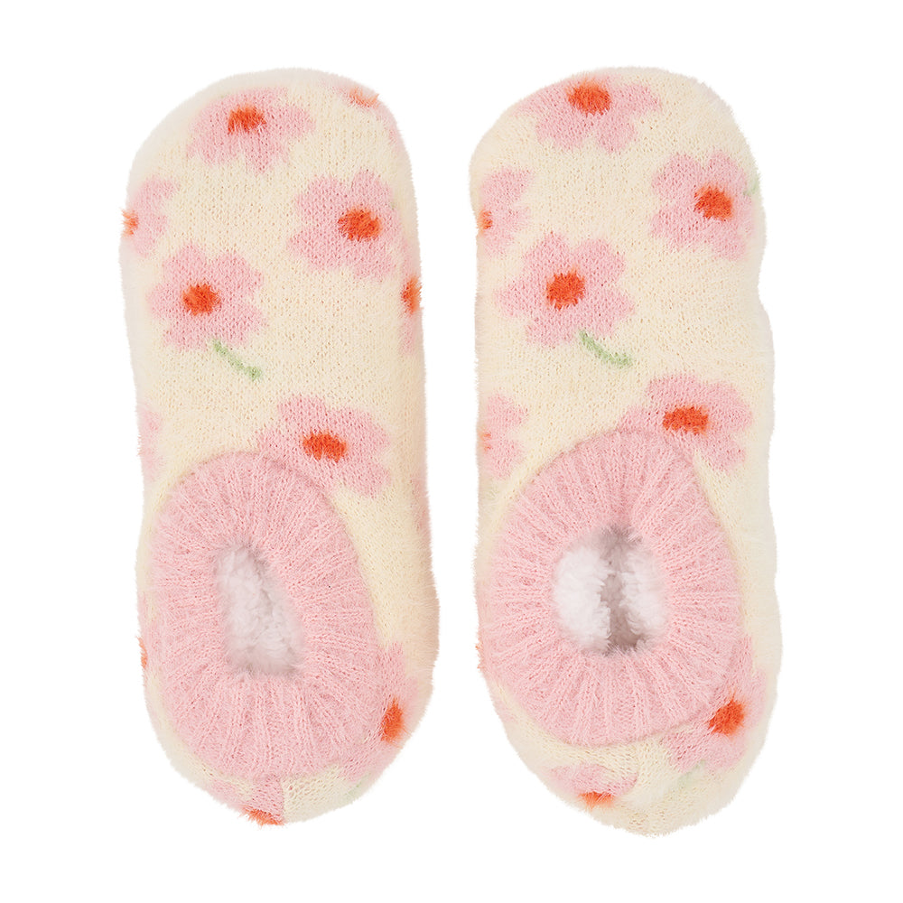 Pair of soft, pink floral fuzzy bootie slippers on a white background