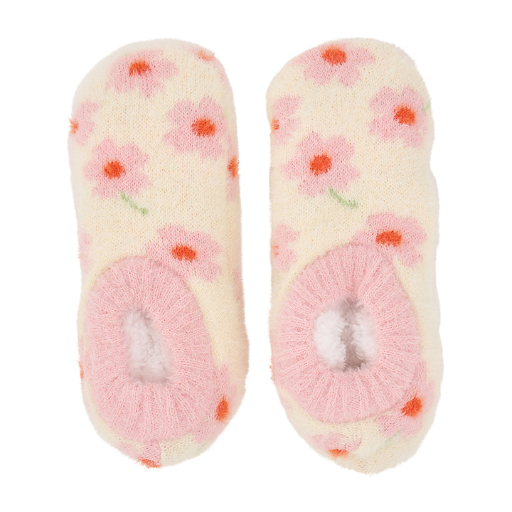 Pair of soft, pink floral fuzzy bootie slippers on a white background