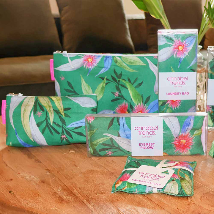 Green floral-patterned products on a wooden surface with 'annabel Trends' branding.