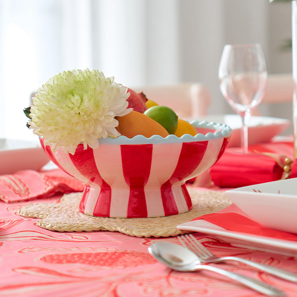 Annabel Trends trailing natives linen tablecloth and red stripe ceramic bowl